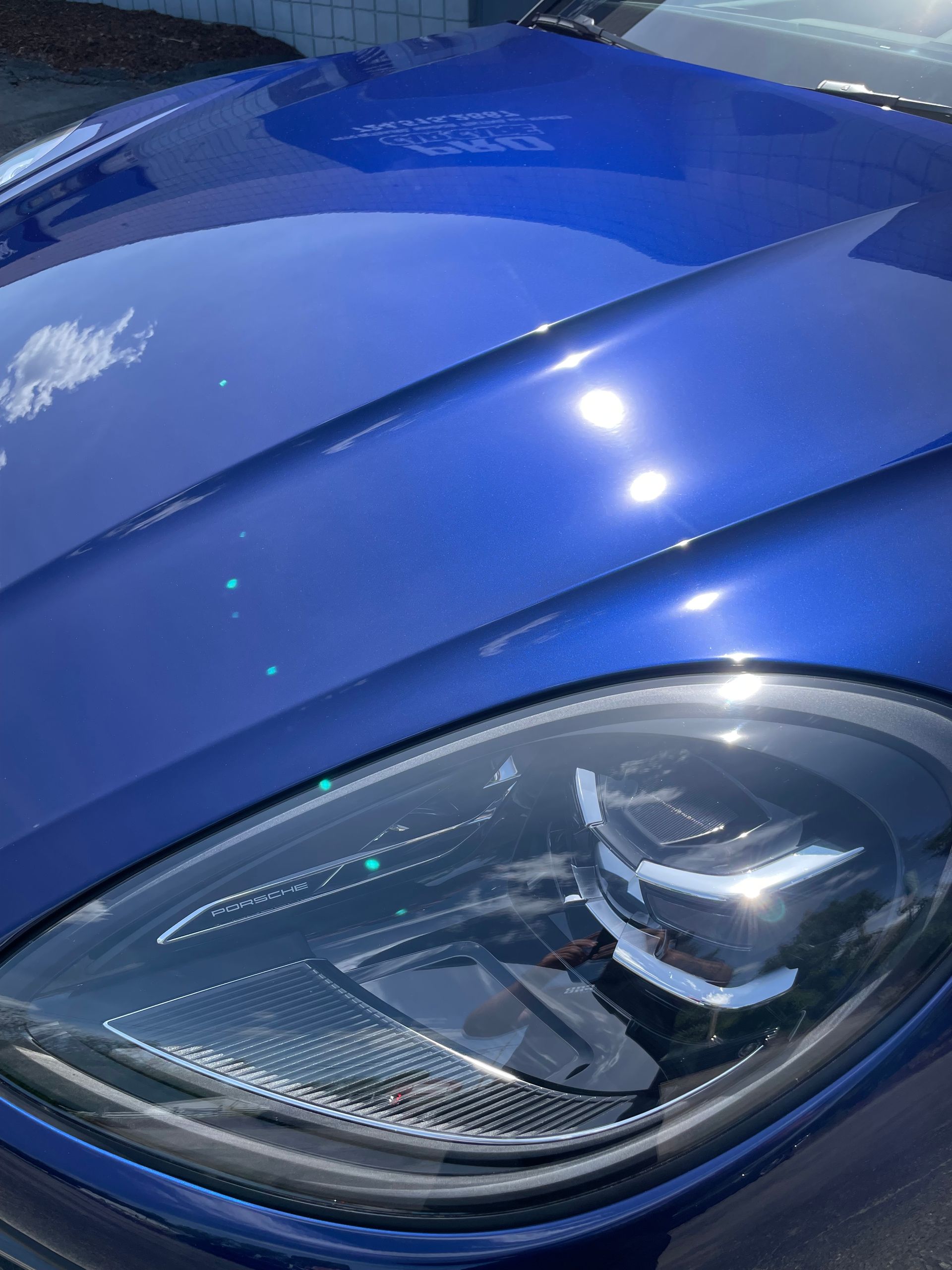 Porsche paint correction in progress before ceramic coating